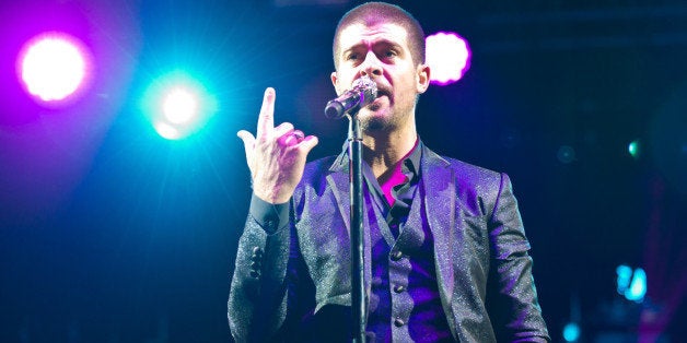 LONDON, UNITED KINGDOM - JULY 06: Robin Thicke performs on stage at Wireless Festival at Finsbury Park on July 6, 2014 in London, United Kingdom. (Photo by Joseph Okpako/Redferns via Getty Images)