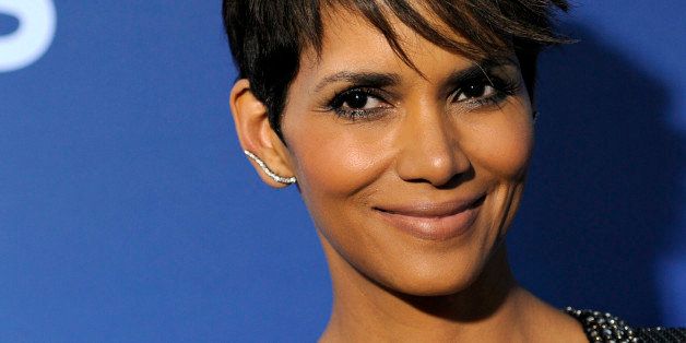 Halle Berry, a cast member in the CBS science fiction television series "Extant," poses at the premiere of the series on Monday, June 16, 2014 in Los Angeles. (Photo by Chris Pizzello/Invision/AP)