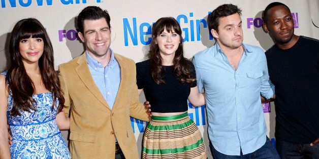 Actors from left, Hannah Simone, Max Greenfield, Zooey Deschanel, Jake Johnson and Lamorne Morris arrive at the Academy's screening and Q and A of the television series "New Girl" at the Leonard H. Goldenson Theatre on Tuesday, April 30, 2013 in Los Angeles. (Photo by Richard Shotwell/Invision/AP)