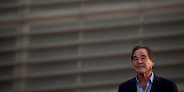 U.S. film director, Oliver Stone poses during a photocall for the 61st San Sebastian Film Festival, in San Sebastian, northern Spain, Tuesday, Sept. 24, 2013. (AP Photo/Alvaro Barrientos)