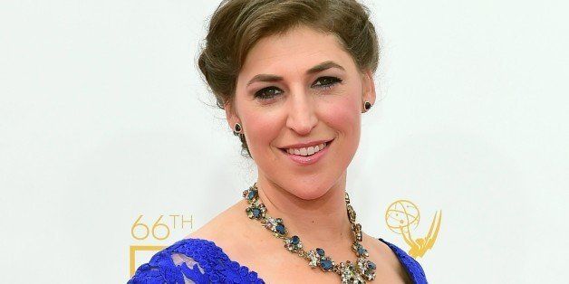 Mayim Bialik arrives on the red carpet for the 66th Emmy Awards, August 25, 2014 at Nokia Theatre in Los Angeles, California. AFP PHOTO / Frederic J. Brown (Photo credit should read FREDERIC J. BROWN/AFP/Getty Images)