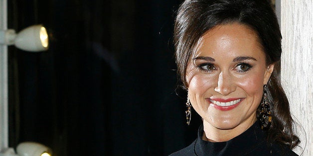 Pippa Middleton, sister to the Duchess of Cambridge, formerly known as Kate Middleton, poses for the media as she arrives at