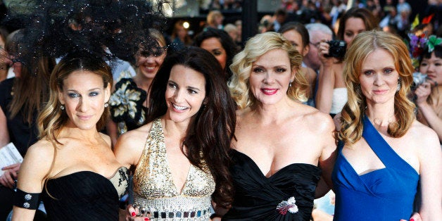From left, U.S. actors Sarah Jessica Parker, Kristin Davis, Kim Cattrall, and Cynthia Nixon pose for photographers as they ar