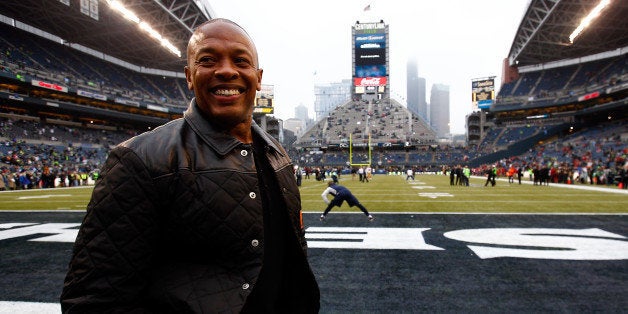 SEATTLE, WA - JANUARY 19: Musician Dr. Dre on the field before the Seattle Seahawks take on the San Francisco 49ers at CenturyLink Field on January 19, 2014 in Seattle, Washington. (Photo by Jonathan Ferrey/WireImage)