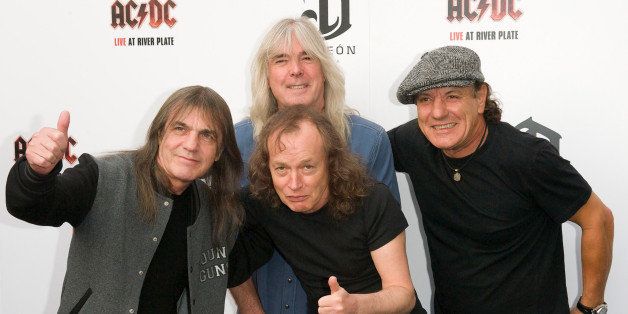 (L-R) AC/DC band members Malcolm Young, Cliff Williams, Angus Young and Brian Johnson attend the Exclusive World Premiere Of AC/DC 'Live At River Plate' Presented By DeLeon Tequila at the HMV Apolo on May 6, 2011 in London, England.