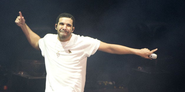 MOUNTAIN VIEW, CA - SEPTEMBER 16: Rapper Drake performs during the Drake vs. Lil Wayne Tour at Shoreline Amphitheatre on September 16, 2014 in Mountain View, California. (Photo by C Flanigan/FilmMagic)