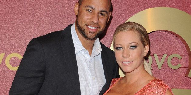 BEVERLY HILLS, CA - FEBRUARY 28: TV personalities Hank Baskett and Kendra Wilkinson arrive at the QVC 5th Annual Red Carpet Style event at The Four Seasons Hotel on February 28, 2014 in Beverly Hills, California. (Photo by Axelle/Bauer-Griffin/FilmMagic)