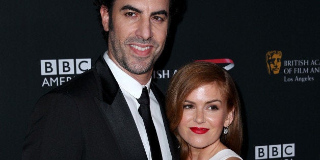 Sacha Baron Cohen, left, and Isla Fisher arrive at the 2013 BAFTA Los Angeles Britannia Awards at the Beverly Hilton Hotel on