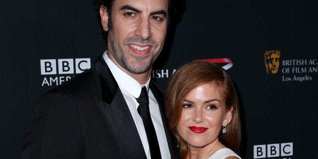 Sacha Baron Cohen, left, and Isla Fisher arrive at the 2013 BAFTA Los Angeles Britannia Awards at the Beverly Hilton Hotel on Saturday, Nov. 9, 2013 in Beverly Hills, Calif. (Photo by Matt Sayles/Invision/AP)