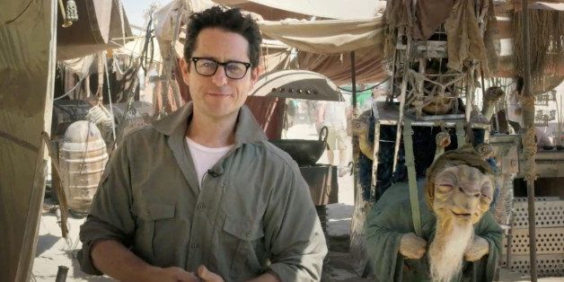 In this video grab made available by Lucasfilm Ltd. & TM on Thursday, May 22, 2014, J.J. Abrams, director of "Star Wars: Episode VII," talks to the fans from the movie set in the desert in Abu Dhabi, United Arab Emirates. The media company, twofour54, backed by the Gulf federation's capital of Abu Dhabi announced Wednesday that the next installment of "Star Wars" is currently filming in the oil-rich Middle Eastern emirate. (AP Photo/Lucasfilm Ltd.)