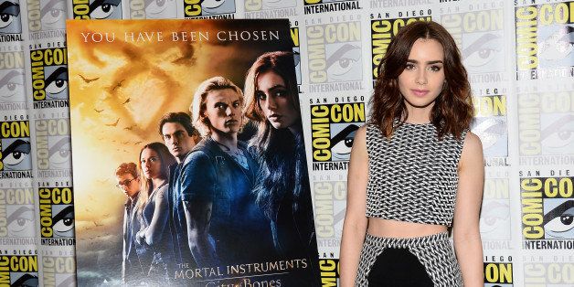 SAN DIEGO, CA - JULY 19: Actress Lily Collins attends 'The Mortal Instruments: City of Bones' press line during Comic-Con International 2013 at the Hilton San Diego Bayfront Hotel on July 19, 2013 in San Diego, California. (Photo by Ethan Miller/Getty Images)