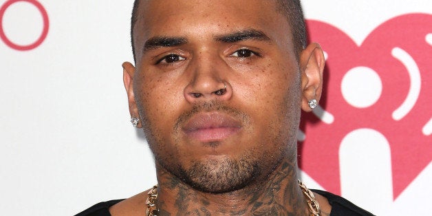 LAS VEGAS, NV - SEPTEMBER 19: Singer Chris Brown poses in the press room at the iHeartRadio Music Festival Night 1 at the MG