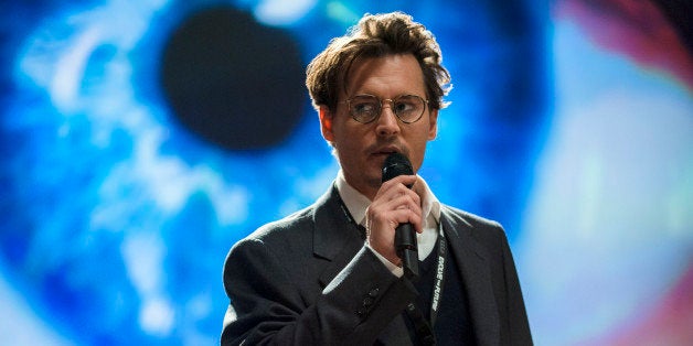 This image released by Warner Brothers Pictures shows Johnny Depp in a scene from the sci-fi thriller "Transcendence." (AP Ph