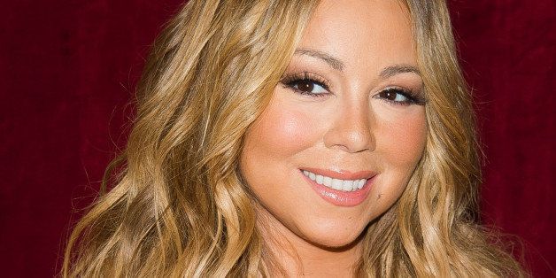 Mariah Carey attends the launch of her Go N'Syde Butterfly beverage on Monday, June 9, 2014 in New York. (Photo by Charles Sykes/Invision/AP)