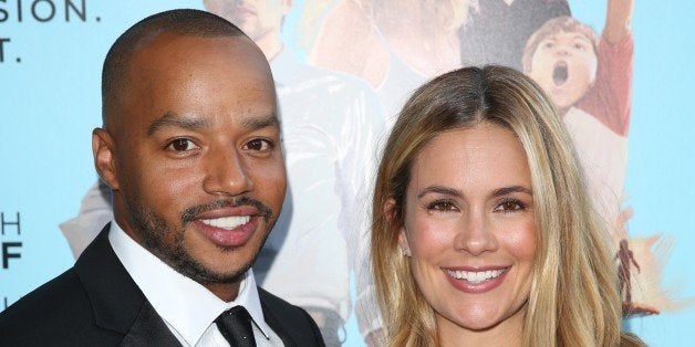 Donald Faison, left, and CaCee Cobb arrive at the Los Angeles premiere of "Wish I Was Here" at the Director