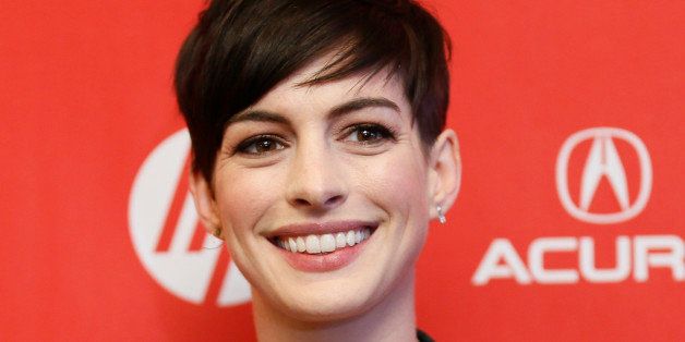 Cast member Anne Hathaway poses at the premiere of the film "Song One" during the 2014 Sundance Film Festival, on Monday, Jan. 20, 2014 in Park City, Utah. (Photo by Danny Moloshok/Invision/AP)