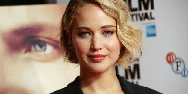 Actress Jennifer Lawrence poses for photographs during the photo call for the film Serena, as part of the BFI London Film Festival, at the Vue cinema in central London, Monday, Oct. 13, 2014. (Photo by Joel Ryan/Invision/AP)