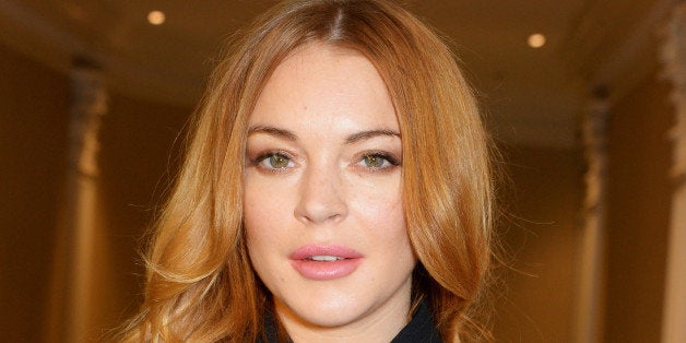 LONDON, ENGLAND - OCTOBER 13: Lindsay Lohan attends The 59th Women of the Year Lunch at the InterContinental Park Lane Hotel on October 13, 2014 in London, England. (Photo by David M. Benett/Getty Images)