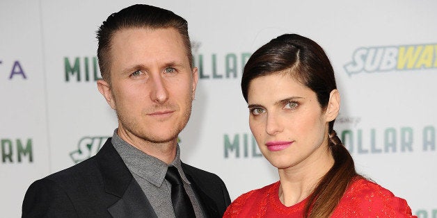 HOLLYWOOD, CA - MAY 06: Actress Lake Bell (R) and husband Scott Campbell attend the premiere of 'Million Dollar Arm' at the El Capitan Theatre on May 6, 2014 in Hollywood, California. (Photo by Jason LaVeris/FilmMagic)