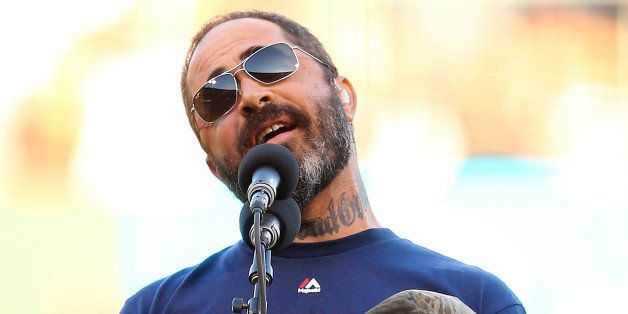 SAN FRANCISCO, CA - OCTOBER 26: Singer Aaron Lewis performs the national anthem prior to Game Five of the 2014 World Series between the San Francisco Giants and the Kansas City Royals at AT&T Park on October 26, 2014 in San Francisco, California. (Photo by Elsa/Getty Images)