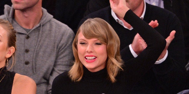 NEW YORK, NY - OCTOBER 29: Taylor Swift attends the Chicago Bulls vs New York Knicks game at Madison Square Garden on October 29, 2014 in New York City. (Photo by James Devaney/GC Images)