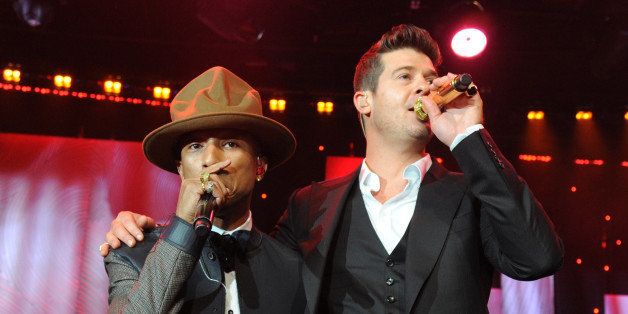 LOS ANGELES, CA - JANUARY 25: Pharrell Williams and Robin Thicke perform onstage during the 56th annual GRAMMY Awards Pre-GRAMMY Gala and Salute to Industry Icons honoring Lucian Grainge at The Beverly Hilton on January 25, 2014 in Los Angeles, California. (Photo by Kevin Mazur/WireImage)