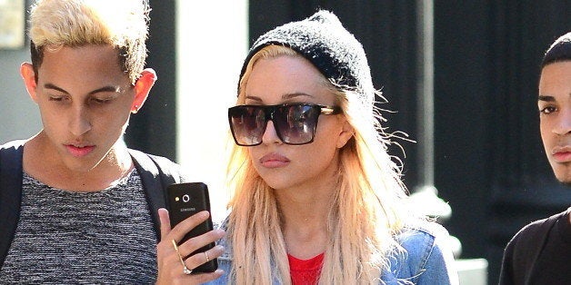 NEW YORK, NY - OCTOBER 06: Actress Amanda Bynes is seen with friends in Soho on October 6, 2014 in New York City. (Photo by