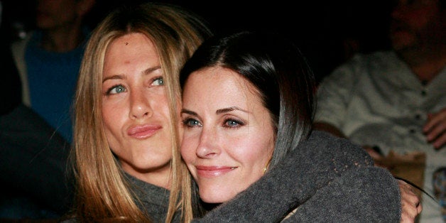 Former "Friends" tv sitcom castmates Jennifer Aniston, left, and Courteney Cox-Arquette pose together at the premiere of "The Tripper" in Los Angeles on Wednesday, April 11, 2007. The film, written and directed by Courteney's husband, David Arquette, and the couple starred in the horror film. (AP Photo/Matt Sayles)