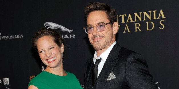 Susan Downey, left, and Robert Downey Jr. arrive at the BAFTA Los Angeles Britannia Awards at the Beverly Hilton Hotel on Thu