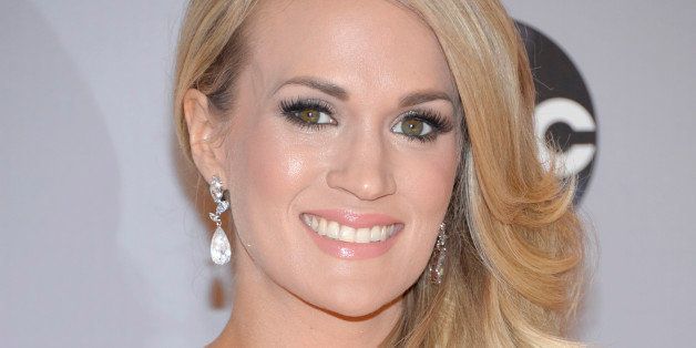 Carrie Underwood arrives at the 48th annual CMA Awards at the Bridgestone Arena on Wednesday, Nov. 5, 2014, in Nashville, Tenn. (Photo by Evan Agostini/Invision/AP)