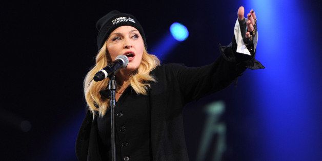 NEW YORK, NY - FEBRUARY 05: Madonna speaks onstage during the Amnesty International Concert presented by the CBGB Festival at Barclays Center on February 5, 2014 in New York City. (Photo by Kevin Mazur/Getty Images for CBGB)