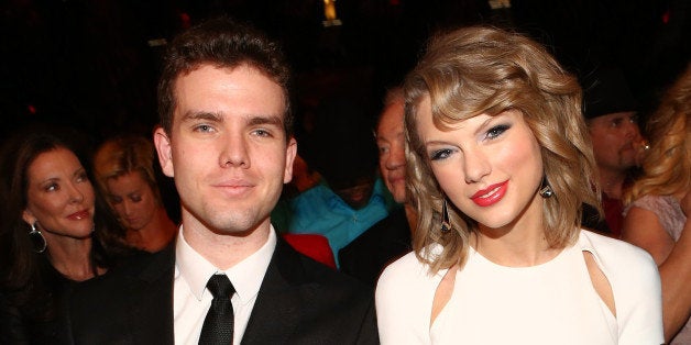 LAS VEGAS, NV - APRIL 06: Austin Swift (L) and recording artist Taylor Swift attend the 49th Annual Academy of Country Music Awards at the MGM Grand Garden Arena on April 6, 2014 in Las Vegas, Nevada. (Photo by Christopher Polk/ACMA2014/Getty Images for ACM)