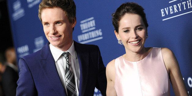 BEVERLY HILLS, CA - OCTOBER 28: Actor Eddie Redmayne and actress Felicity Jones attend the premiere of 'The Theory of Everything' at AMPAS Samuel Goldwyn Theater on October 28, 2014 in Beverly Hills, California. (Photo by Jason LaVeris/FilmMagic)