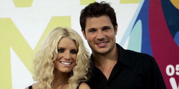 Singer Jessica Simpson and husband Nick Lachey arrive at the MTV Awards at the American Airlines Arena Sunday Aug. 28, 2005 in Miami, Fla. (AP Photo/Alan Diaz)