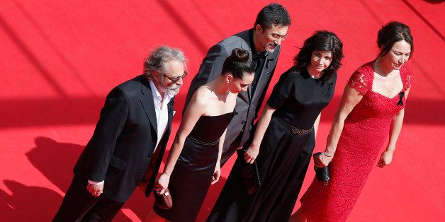 CANNES, FRANCE - MAY 16: (L-R) Actor Haluk Bilginer, actress Melisa Sozen, director Nuri Bilge Ceylan, writer Ebru Ceylan and actress Demet Akbag attend the 'Winter Sleep' premiere during the 67th Annual Cannes Film Festival on May 16, 2014 in Cannes, France. (Photo by Ian Langsdon - Pool/Getty Images)