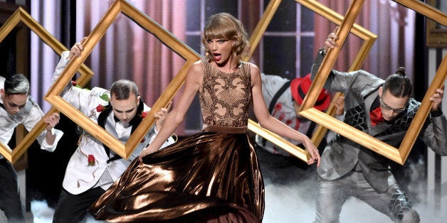 LOS ANGELES, CA - NOVEMBER 23: Recording artist Taylor Swift performs onstage at the 2014 American Music Awards at Nokia The
