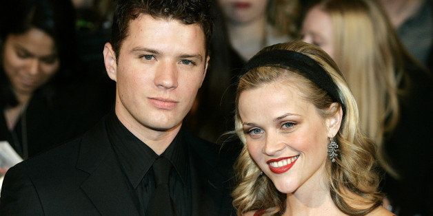 Husband and wife actors Ryan Phillippe and Reese Witherspoon arrive at the premiere of the motion picture "Walk The Line", Sunday, Nov. 13, 2005 at the Beacon Theater in New York. Witherspoon plays June Carter Cash in the film about the life of Johnny Cash. (AP Photo/Stephen Chernin)