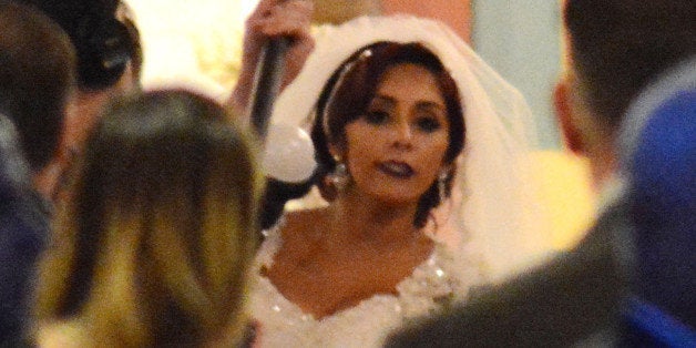 EAST HANOVER, NJ - NOVEMBER 29: Nicole 'Snooki' Polizzi attends her wedding to Jionni LaValle at Saint Rose of Lima Church o