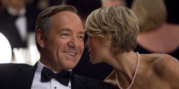 This image released by Netflix shows Kevin Spacey as U.S. Congressman Frank Underwood, left, and Robin Wright as Claire Underwood in a scene from the Netflix original series, "House of Cards." The new original series arrived in one big helping _ all 13 episodes of its first season _ on the subscription streaming service on Friday, Feb. 1, 2013, for viewers to enjoy, at their leisure, in the weeks, months or even years to come. (AP Photo/Netflix, Melinda Sue Gordon) (AP Photo/Netflix)