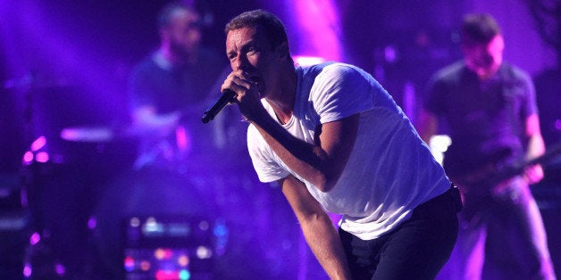 LAS VEGAS, NV - SEPTEMBER 19: Frontman Chris Martin of Coldplay performs onstage during the 2014 iHeartRadio Music Festival
