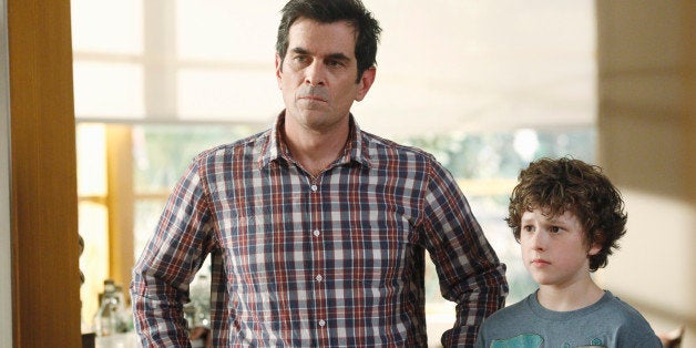 MODERN FAMILY - Emmy and Golden Globe Award-winning 'Modern Family' returns for its fourth season, WEDNESDAY, SEPTEMBER 26 (9:00-9:31 p.m., ET) on the ABC Television Network. In the Season 4 premiere, 'Bringing Up Baby,' Jay's birthday is upon us again and, as before, he makes it well-known that he wishes to keep it as low key as possible, with no grand gestures or surprises. But leave it to the family to miss the mark yet again! Phil takes Jay on a very unconventional fishing trip with his buddies, and Gloria struggles with how to break the pregnancy news to him. Meanwhile, Dylan moves into the Dunphy household temporarily, and Mitch and Cam decide to look into adopting a cat as they continue to cope with their failed attempt to adopt another child. (Photo by Peter 'Hopper' Stone/ABC via Getty Images)TY BURRELL, NOLAN GOULD