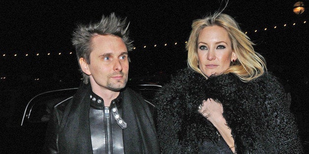LONDON, UNITED KINGDOM - FEBRUARY 21: Matt Bellamy from Muse and Kate Hudson are seen on February 21, 2013 in London, United