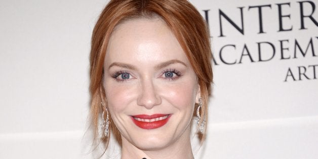 Actress Christina Hendricks poses in the International Emmy Awards press room at the New York Hilton on Monday, Nov. 24, 2014