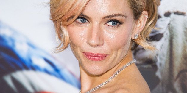 Sienna Miller attends the "American Sniper" premiere on Monday, Dec. 15, 2014 in New York. (Photo by Charles Sykes/Invision/AP)