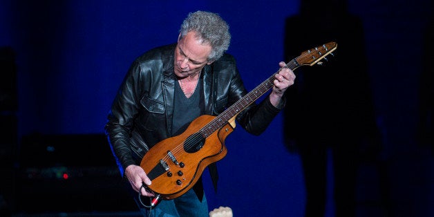 DENVER, CO - DECEMBER 12: Lindsey Buckingham of Fleetwood Mac performs during the band's 'On With The Show' tour at the Pepsi Center on December 12, 2014, in Denver, Colorado. (Photo by Daniel Petty/The Denver Post via Getty Images)