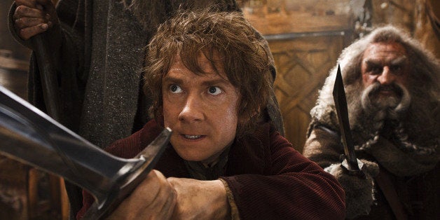 This image released by Warner Bros. Pictures shows Martin Freeman, left, and John Callen in a scene from "The Hobbit: The Desolation of Smaug." (AP Photo/Warner Bros. Pictures, Mark Pokorny)