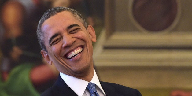 President Barack Obama smiles as he meets Pope Francis at the Vatican Thursday, March 27, 2014. President Barack Obama called himself a "great admirer" of Pope Francis as he sat down at the Vatican Thursday with the pontiff he considers a kindred spirit on issues of economic inequality. Their historic first meeting comes as Obama's administration and the church remain deeply split on issues of abortion and contraception. (AP Photo/Gabriel Bouys, Pool)