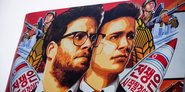 A banner for "The Interview"is posted outside Arclight Cinemas, Wednesday, Dec. 17, 2014, in the Hollywood section of Los Angeles. A U.S. official says North Korea perpetrated the unprecedented act of cyberwarfare against Sony Pictures that exposed tens of thousands of sensitive documents and escalated to threats of terrorist attacks that ultimately drove the studio to cancel all release plans for "The Interview." (AP Photo/Damian Dovarganes)