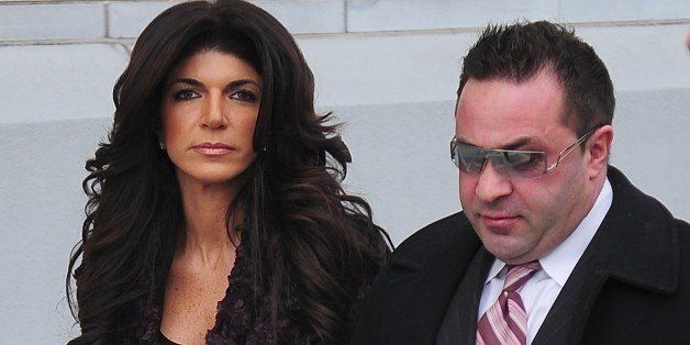 NEWARK, NJ - MARCH 04: Teresa Giudice and Joe Giudice are seen outside a federal criminal court, where they face mortgage and bankruptcy fraud charges on March 4, 2014 in Newark, New Jersey. (Photo by Alo Ceballos/GC Images