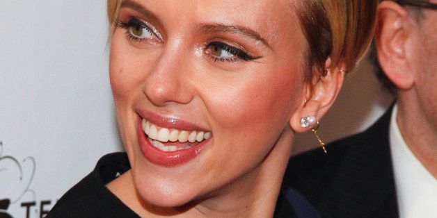 Scarlett Johansson attends the Champions of Rockaway Hurricane Sandy Fundraiser at Hudson Terrace on Tuesday, Nov. 18, 2014, in New York. (Photo by Andy Kropa/Invision/AP)